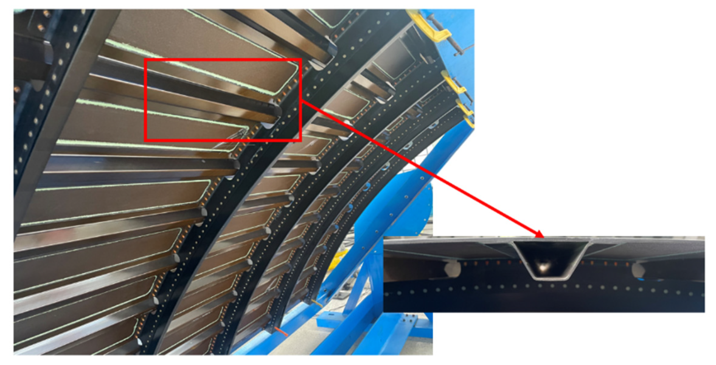 Structural panel with a composite top-hat stiffener